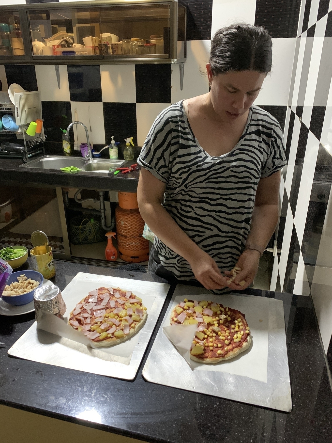 Mel making home made pizzas